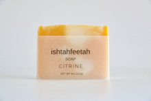 Load image into Gallery viewer, Yellow, natural soap. With peppermint & sweet orange essential oil.  Vellum paper wrapping.