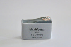 Ishtahfeetah Soapery Solitude handcrafted natural soap. Grey activated charcoal soap topped with pink Himalayan sea salt.