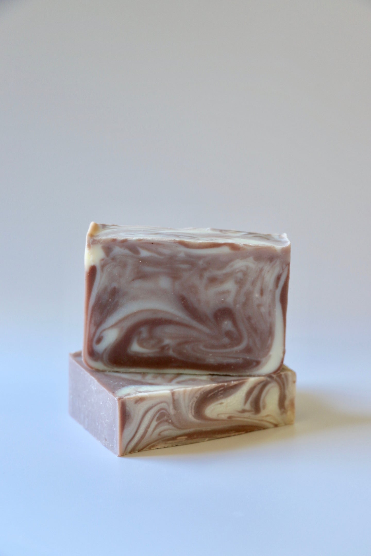 Purple Brazilian clay with white swirls. Handcrafted natural soap. Ishtahfeetah soapery.