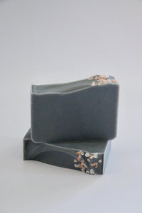 Ishtahfeetah Soapery Solitude handcrafted natural soap. Grey activated charcoal soap topped with pink Himalayan sea salt.