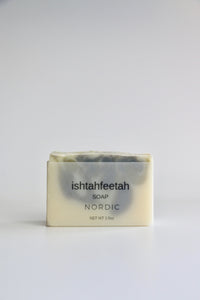Nordic natural, handcrafted soap. Swirls of blue & green; vellum paper packaging.