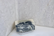 Load image into Gallery viewer, Clear, plastic, flexible mini soap lift holding soap in shower.  